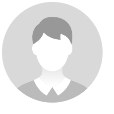 black and white icon image of a head and shoulder person with collared shirt and short hair with bangs